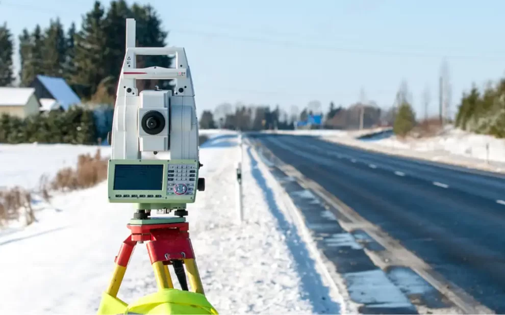 Using a commercial land survey tripod during snow.
