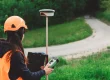 A person operating a GNSS Device.